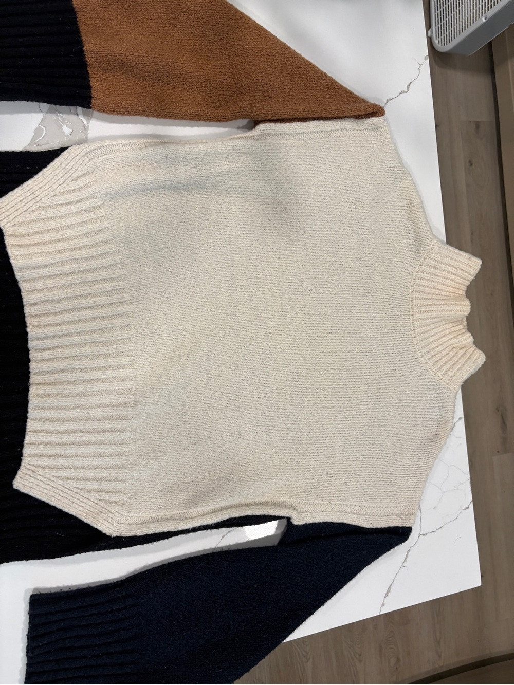 FRAME Women’s Colorblock Mock Neck Sweater in Cream, Black, Navy, and Brown